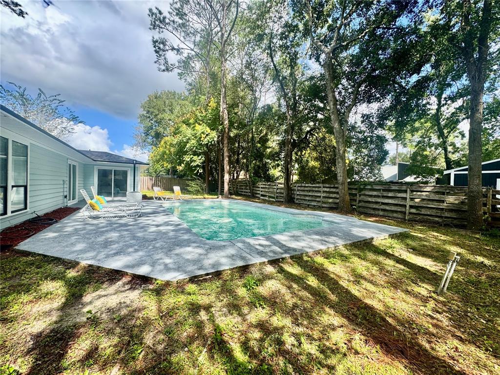 5407 Southwest 82 Terrace Gainesville, FL 32608 - Photo 28 of 31 a view of outdoor space yard and basketball court