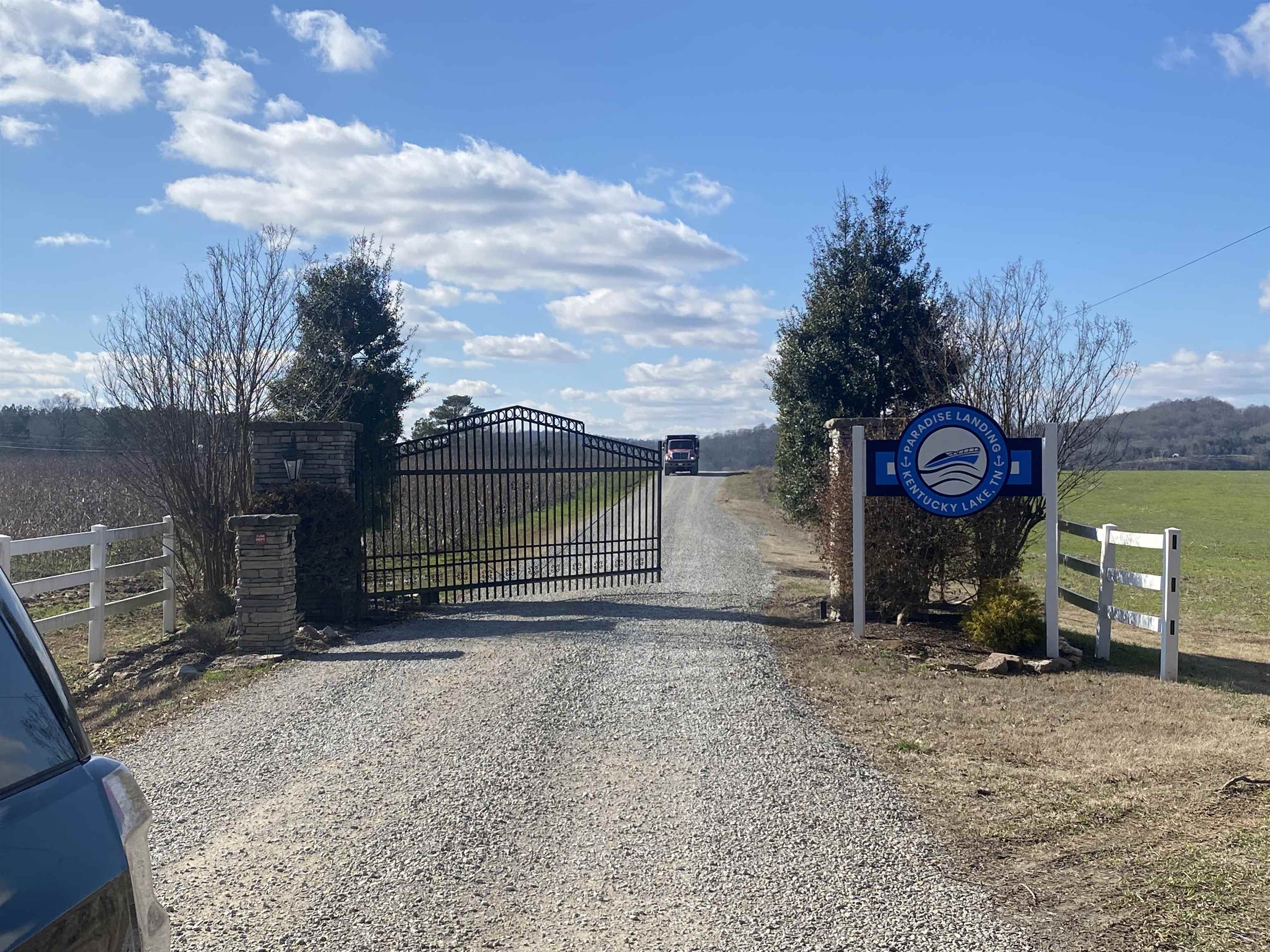 0 Hardin Bottom River Road Clifton, TN 38425 - Photo 3 of 14 a view of a house with a yard and sitting area