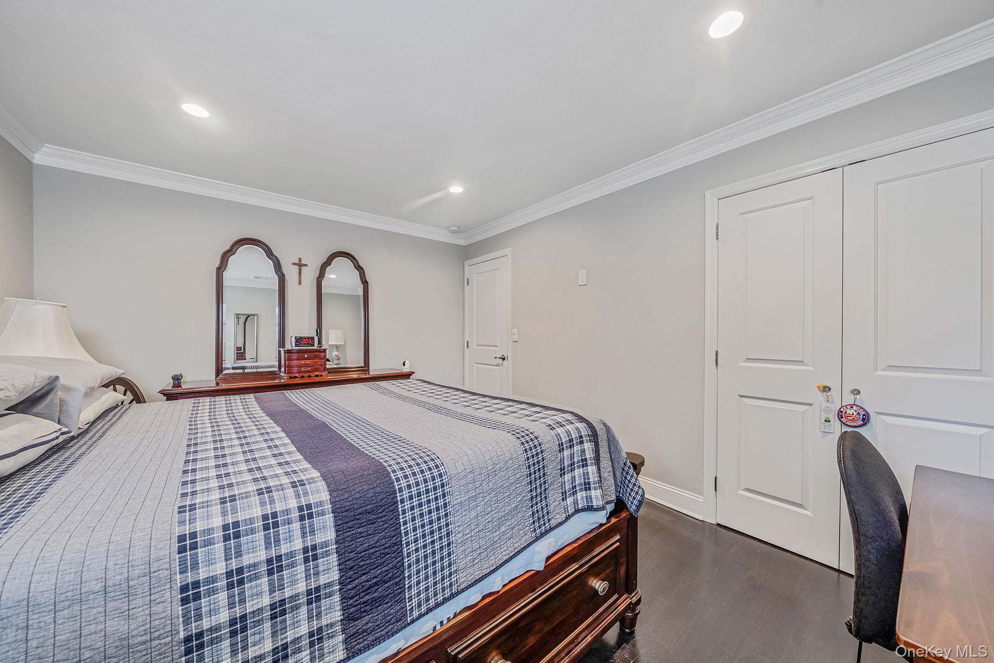 110 Stephen Road Bayport, NY 11705 - Photo 23 of 39 a bedroom with a bed and a dresser
