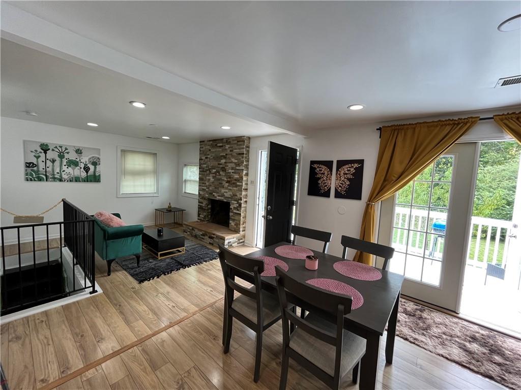 718 Fairburn Road Northwest Atlanta, GA 30331 - Photo 3 of 6 a living room with furniture and a floor to ceiling window