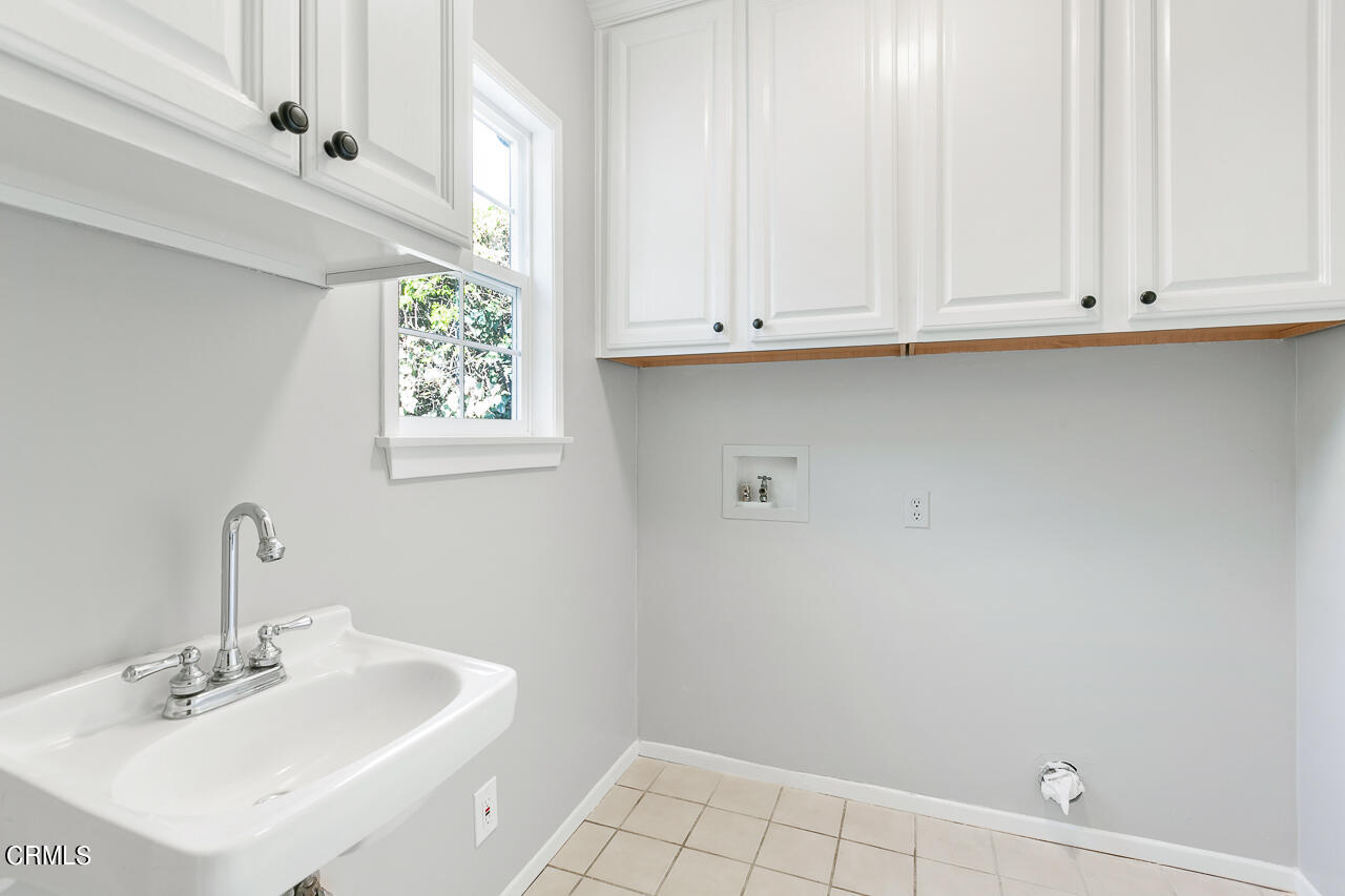 1195 Afton Street Pasadena, CA 91103 - Photo 15 of 36 a bathroom with a sink and a window