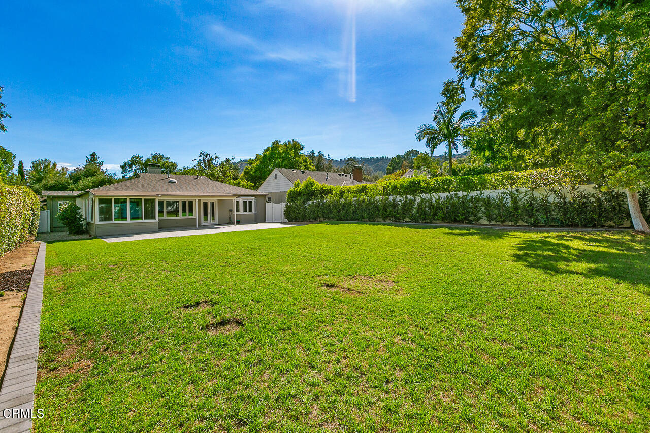 1195 Afton Street Pasadena, CA 91103 - Photo 26 of 36 a view of a house with a big yard