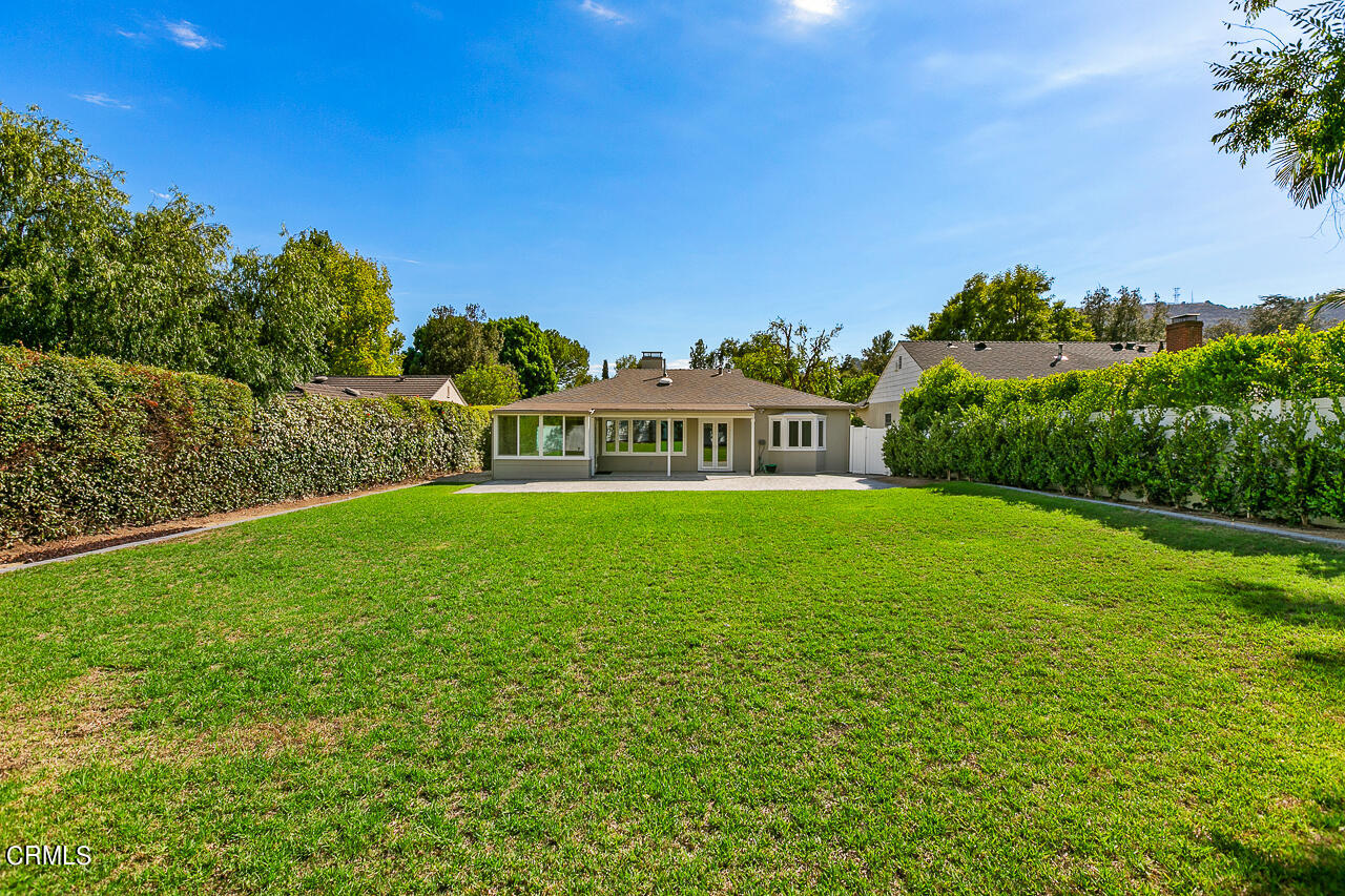 1195 Afton Street Pasadena, CA 91103 - Photo 27 of 36 a view of a garden with plants and large trees