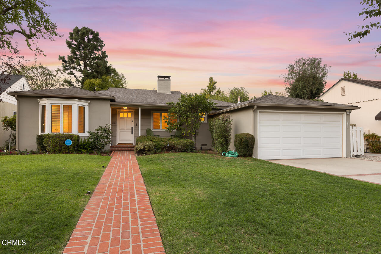 1195 Afton Street Pasadena, CA 91103 - Photo 28 of 36 a front view of a house with a yard