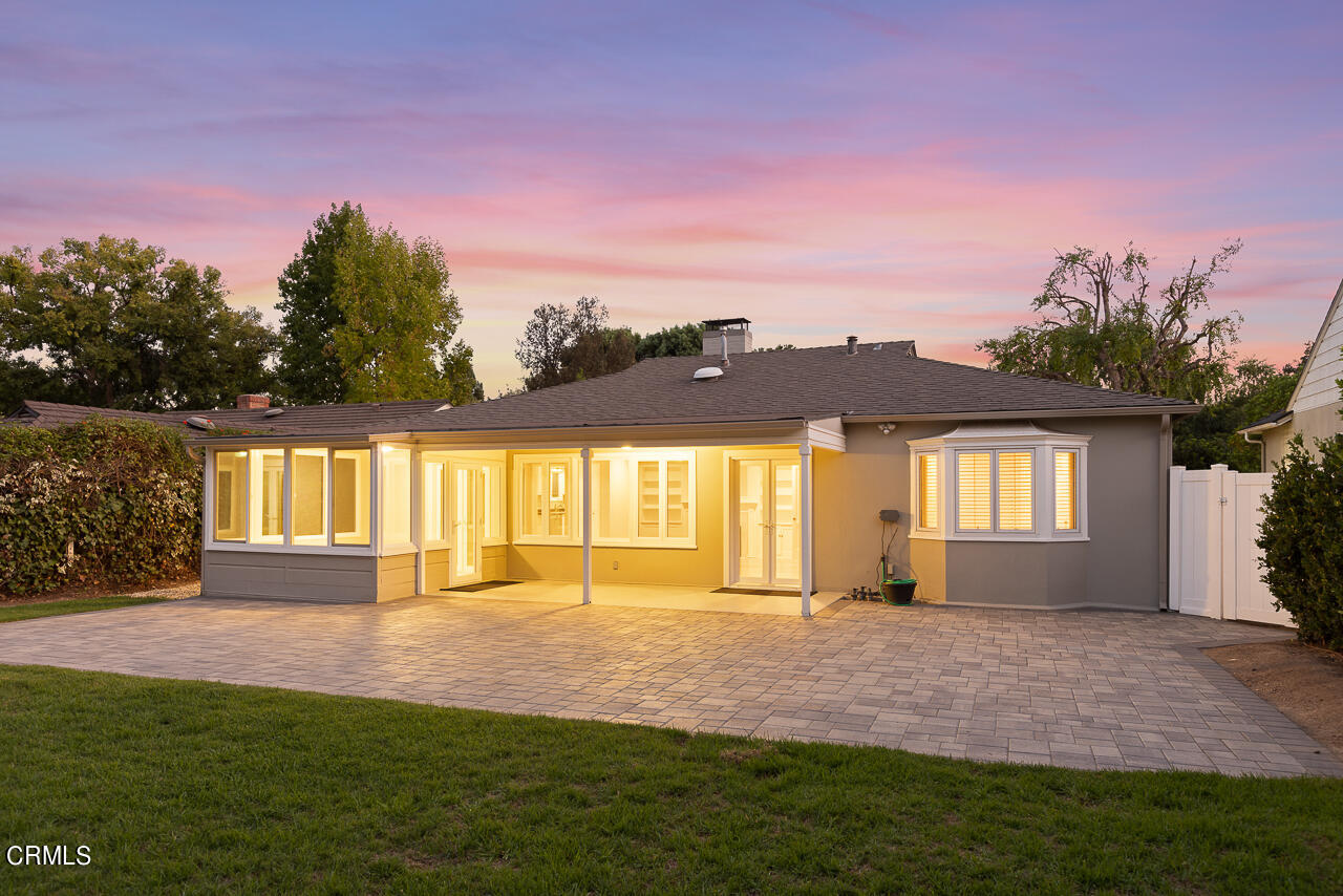 1195 Afton Street Pasadena, CA 91103 - Photo 30 of 36 a front view of a house with a yard and outdoor seating