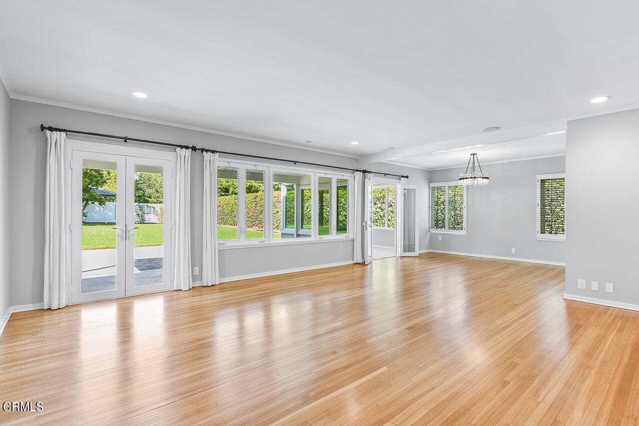 1195 Afton Street Pasadena, CA 91103 - Photo 5 of 36 a view of an empty room with wooden floor and a window