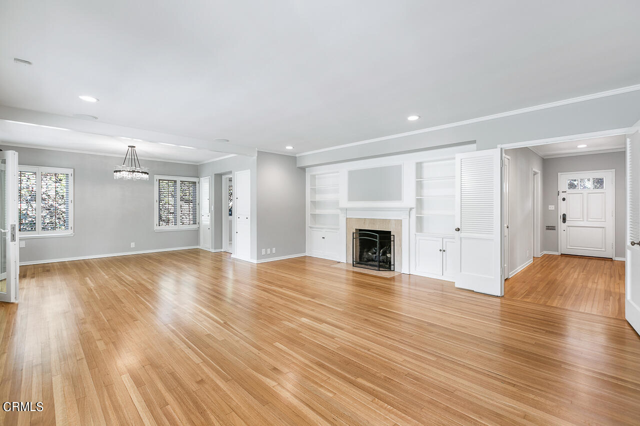 1195 Afton Street Pasadena, CA 91103 - Photo 6 of 36 a view of empty room with wooden floor and fireplace