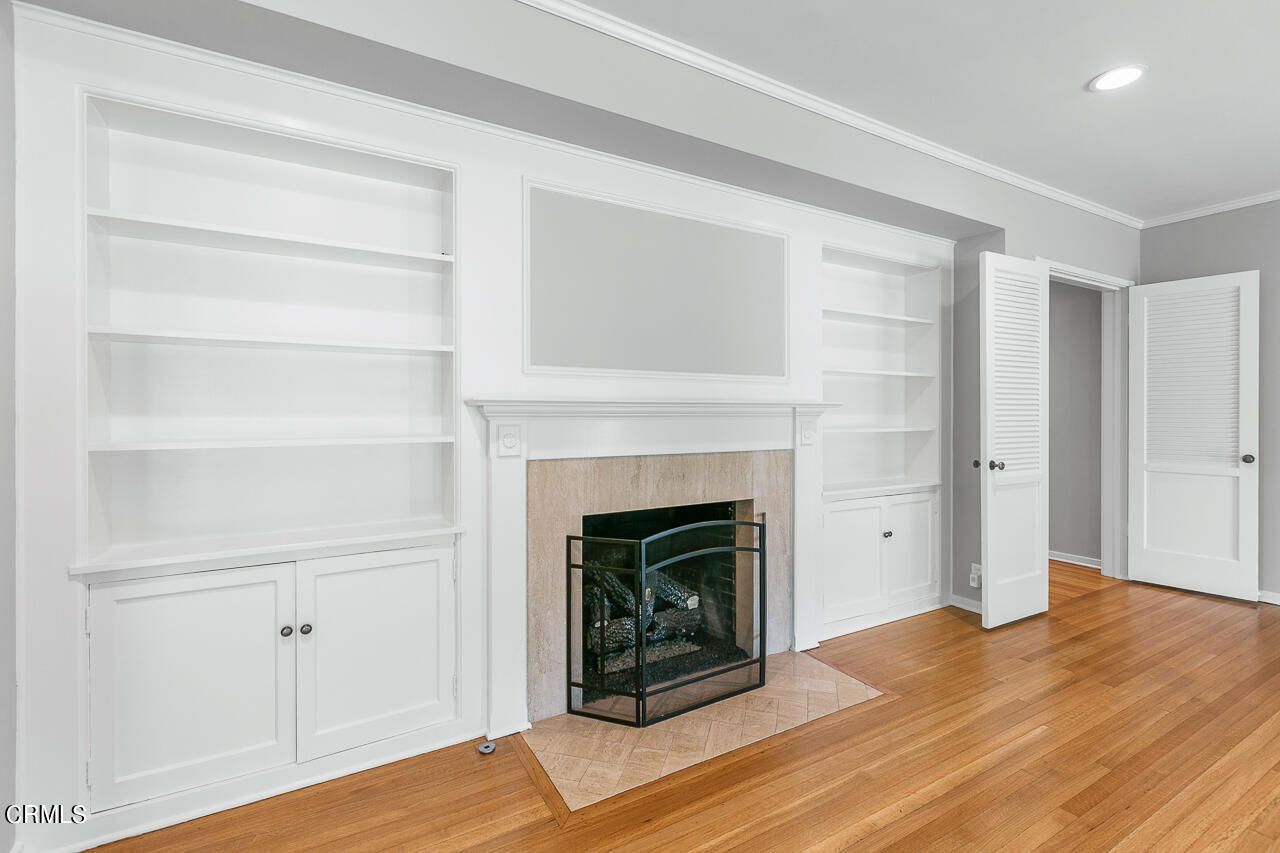 1195 Afton Street Pasadena, CA 91103 - Photo 7 of 36 a living room with a fireplace