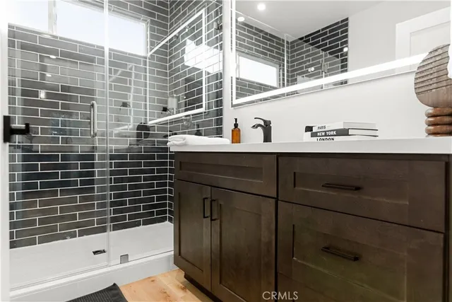 a bathroom with a sink and a shower