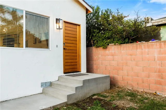 a view of house with outdoor space