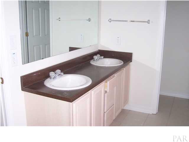 2278 Liberty Loop Road, Unit 24D Cantonment, FL 32533 - Photo 23 of 24 DOUBLE VANITY IN MASTER BATH LOT 24D GLENVIEW SUBDIVISION