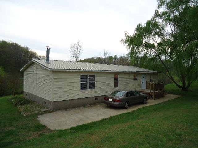 165 Minnie Brown Road Ardmore, TN 38449 - Photo 3 of 20 Rear View of the Home-New deck with concrete parking pad
