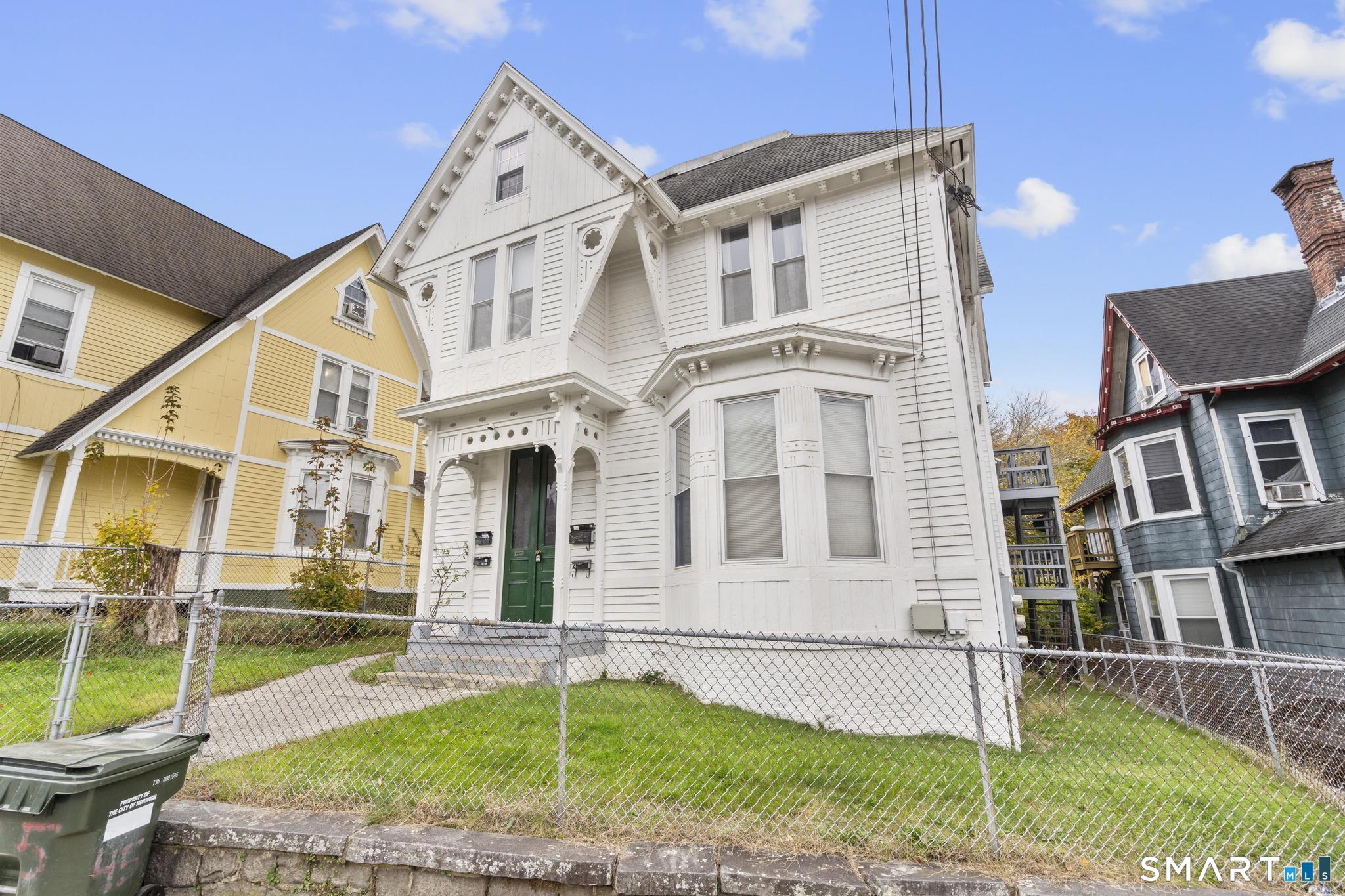 45 Cliff Street Norwich, CT 06360 - Photo 2 of 39 front view of a house with a yard