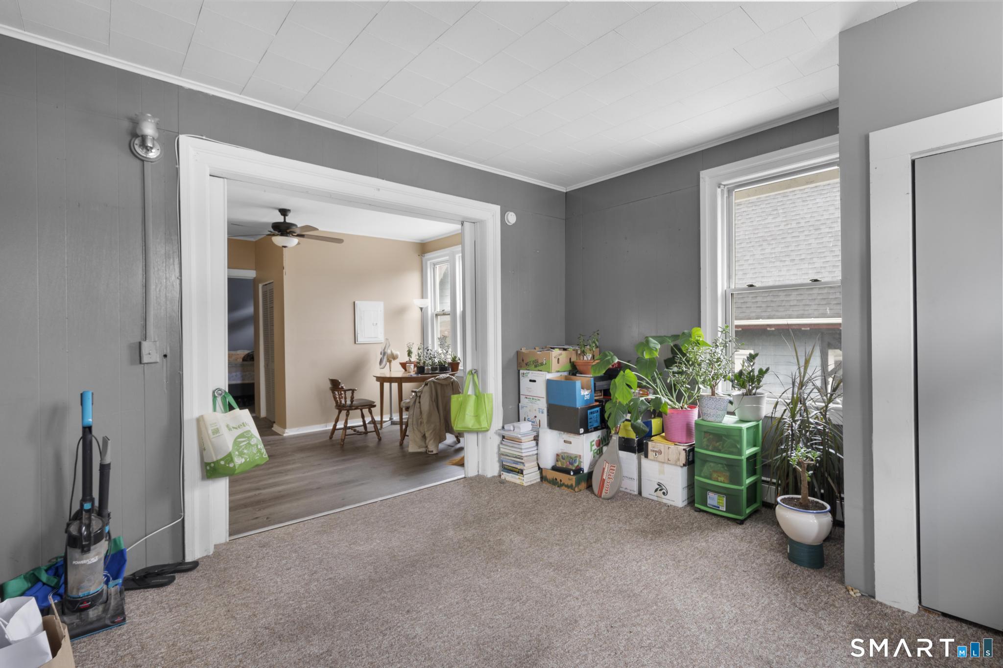 45 Cliff Street Norwich, CT 06360 - Photo 21 of 39 a view of hallway with livingroom and dining room
