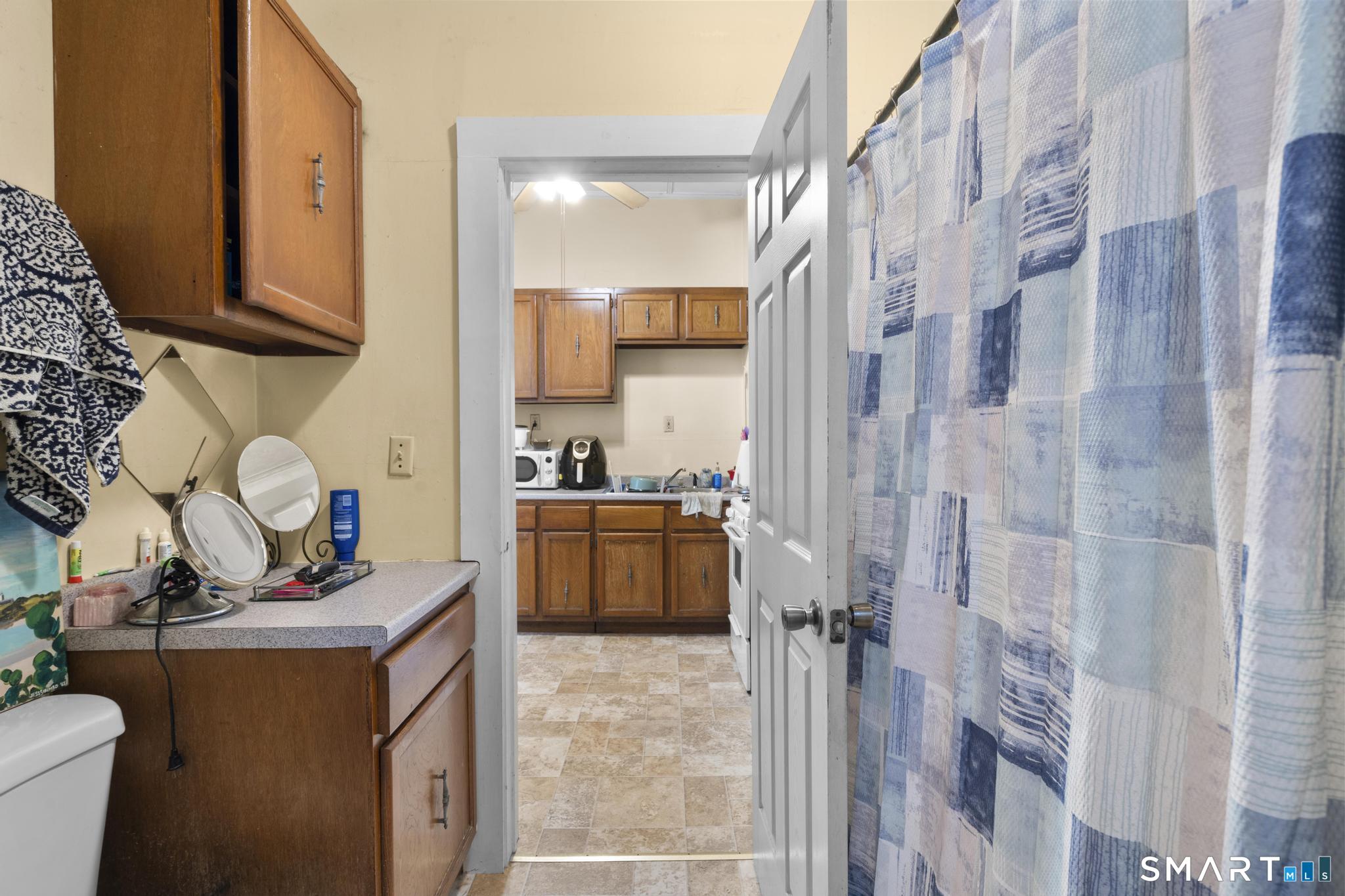 45 Cliff Street Norwich, CT 06360 - Photo 30 of 39 a view of a kitchen with appliances and cabinets