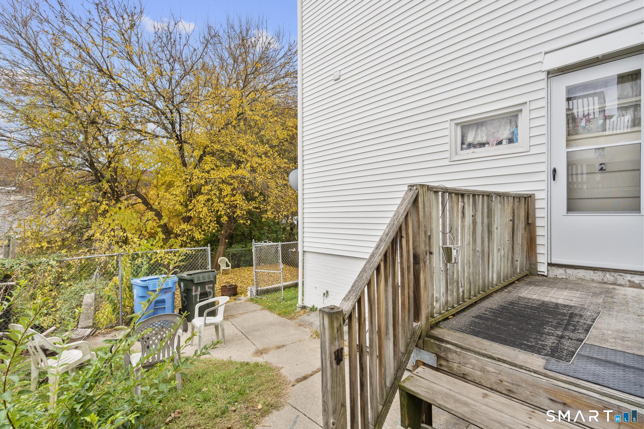 45 Cliff Street Norwich, CT 06360 - Photo 5 of 39 a view of backyard with patio