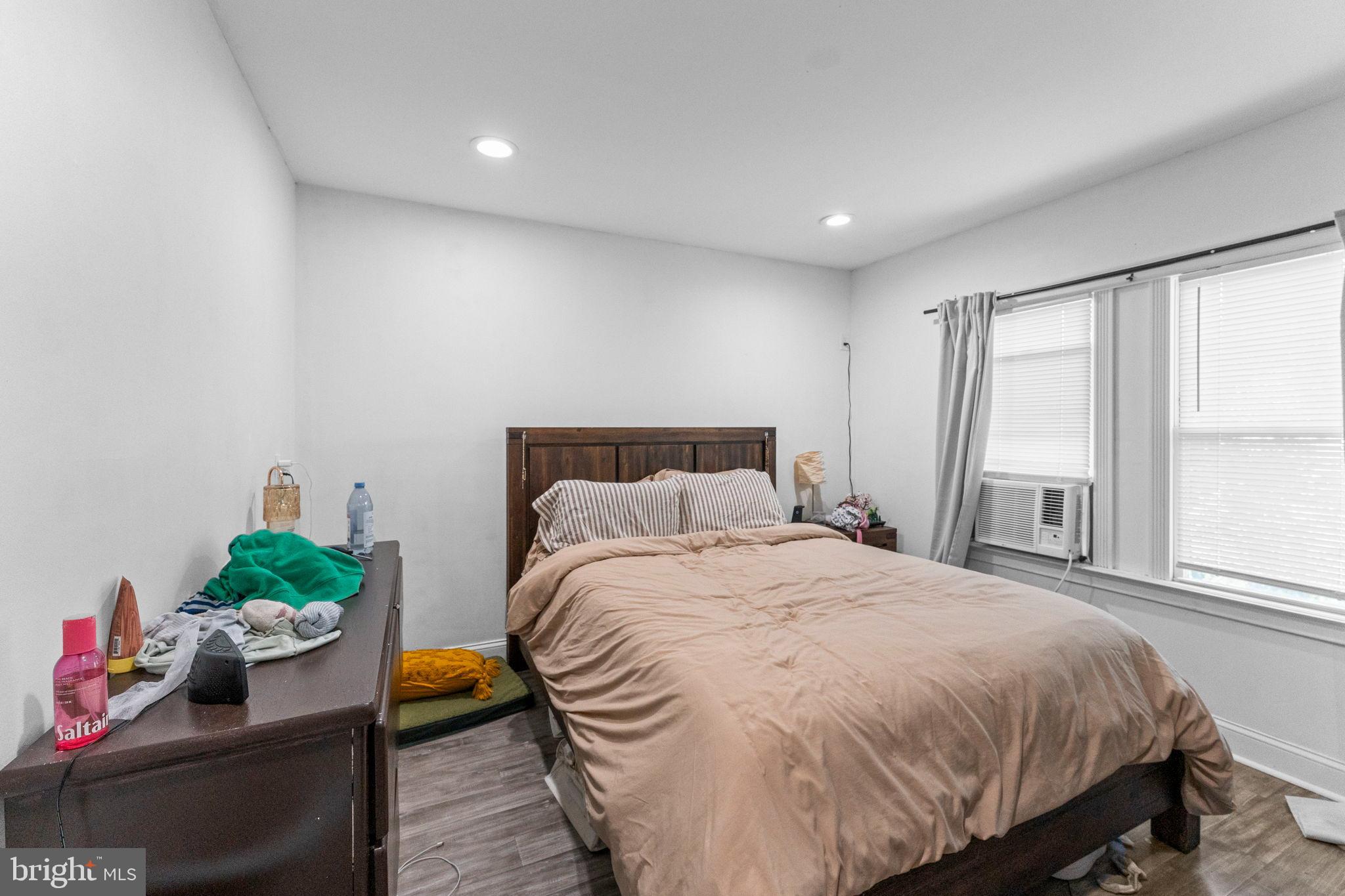 107 Hawthorne Avenue Ewing, NJ 08638 - Photo 14 of 18 a bedroom with a bed and a window