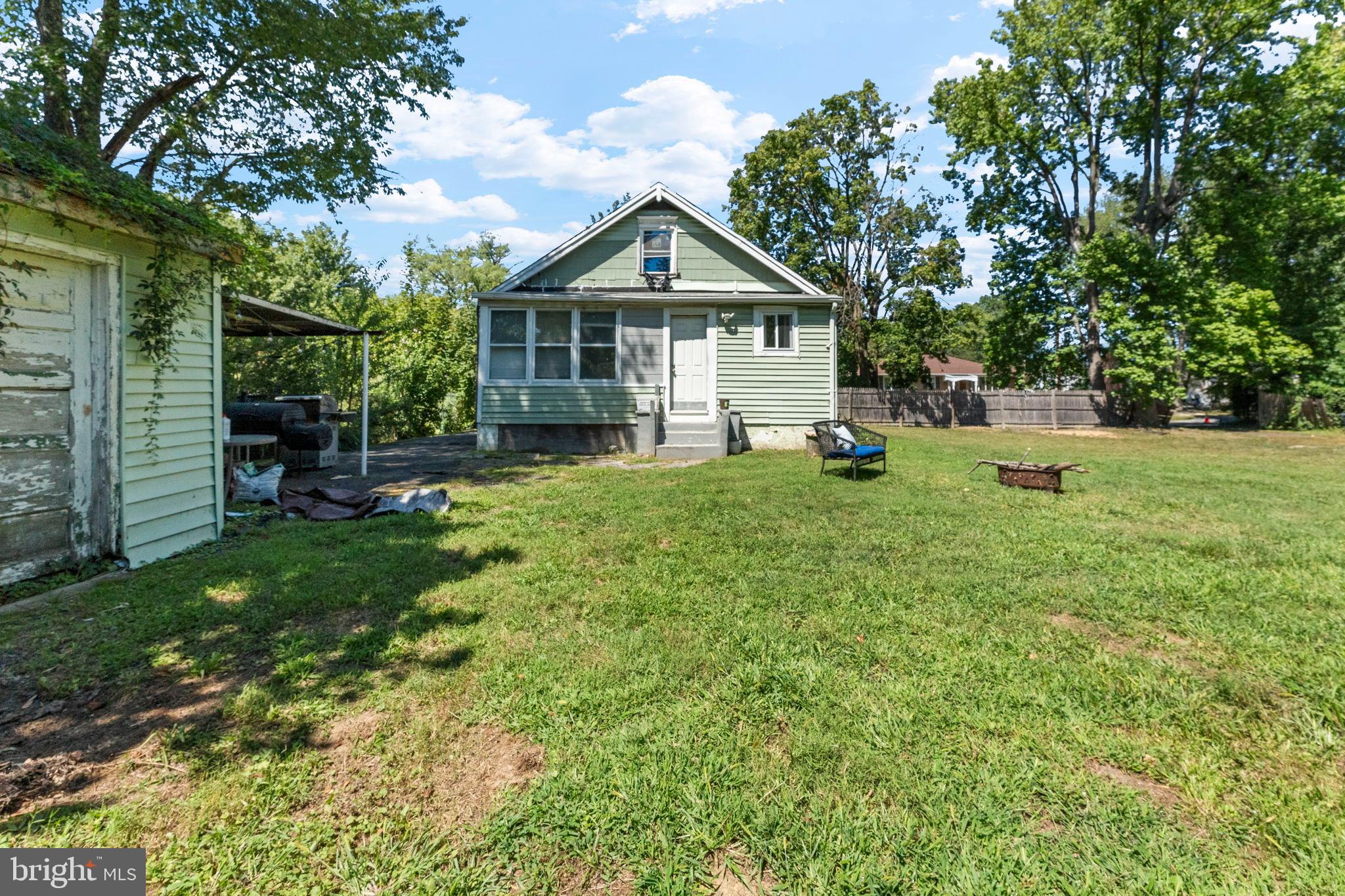 107 Hawthorne Avenue Ewing, NJ 08638 - Photo 15 of 18 a view of a house with yard and sitting area