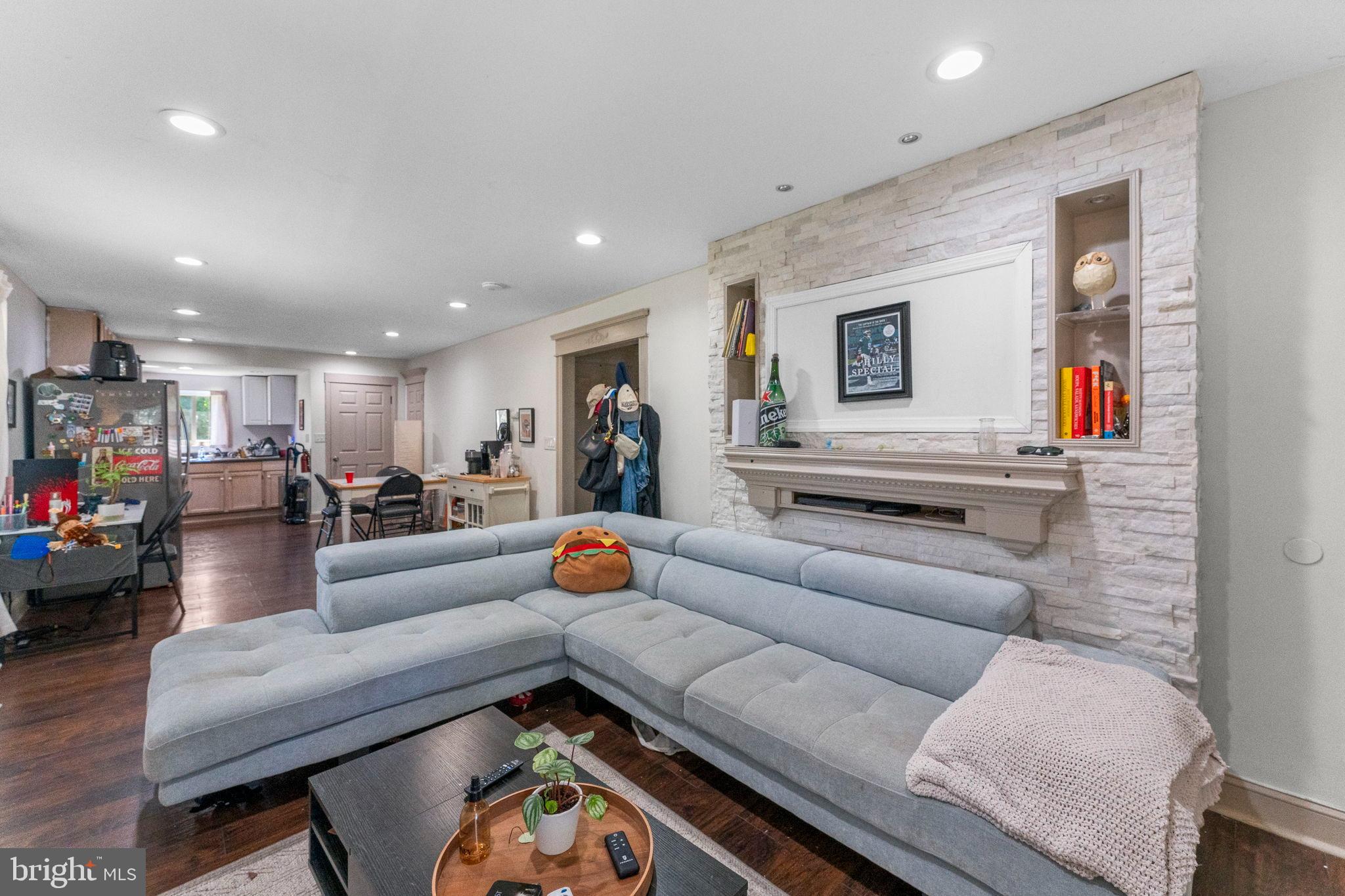 107 Hawthorne Avenue Ewing, NJ 08638 - Photo 5 of 18 a living room with furniture and kitchen view