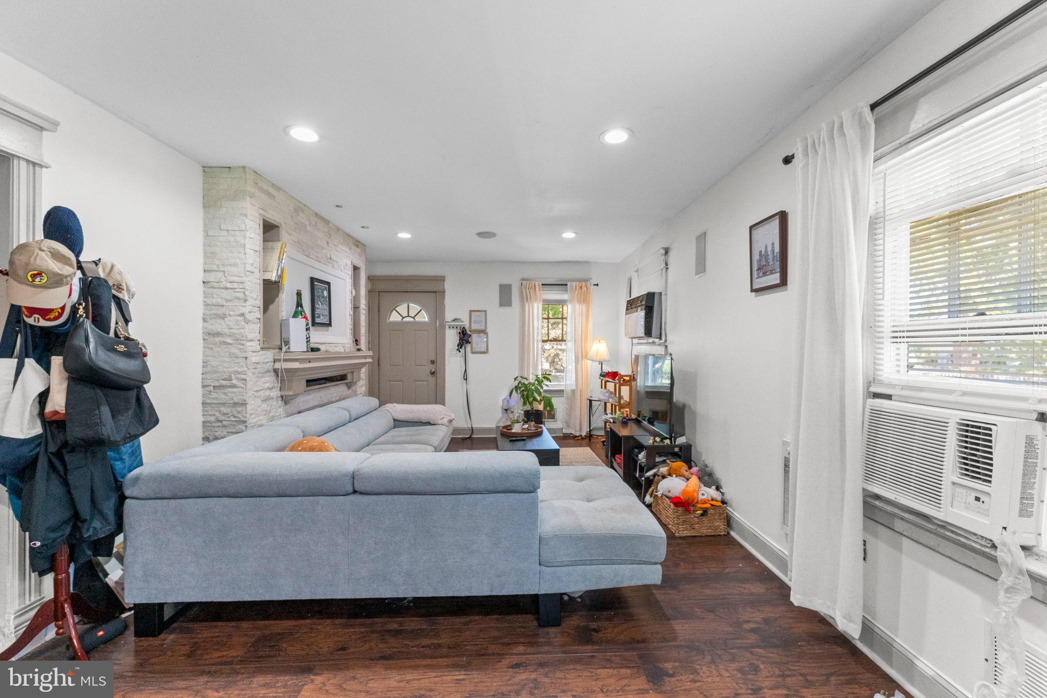 107 Hawthorne Avenue Ewing, NJ 08638 - Photo 6 of 18 a living room with furniture and a flat screen tv