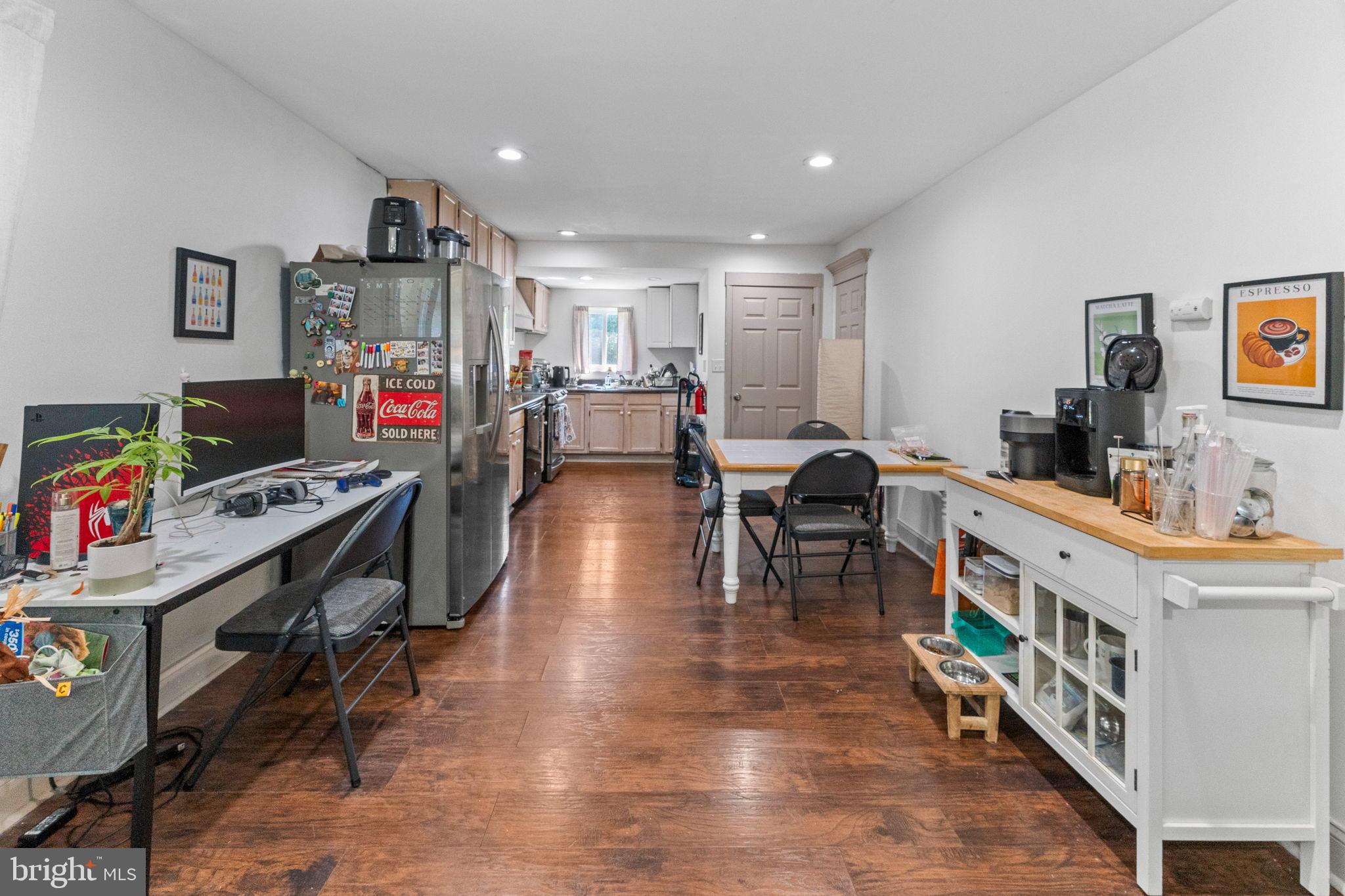 107 Hawthorne Avenue Ewing, NJ 08638 - Photo 7 of 18 a living room with furniture and a flat screen tv