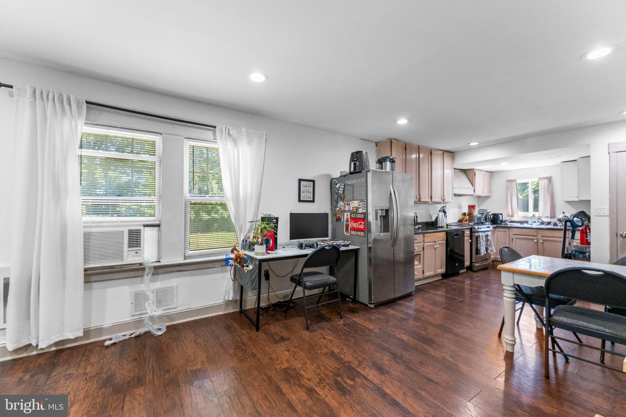 107 Hawthorne Avenue Ewing, NJ 08638 - Photo 8 of 18 a living room with furniture and a wooden floor