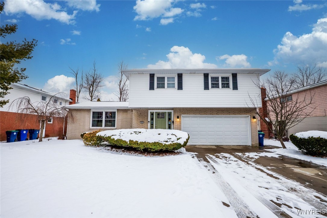 This lovely home offers 2590 sq ft of generous roo