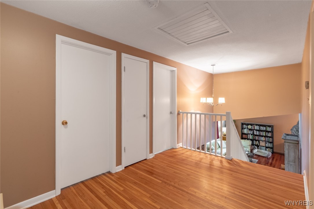 245 Ranch Trail Amherst, NY 14221 - Photo 16 of 37 The small room sized second floor upper hallway ha