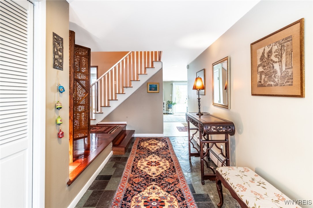 245 Ranch Trail Amherst, NY 14221 - Photo 2 of 37 The generously sized front foyer flows to the fami