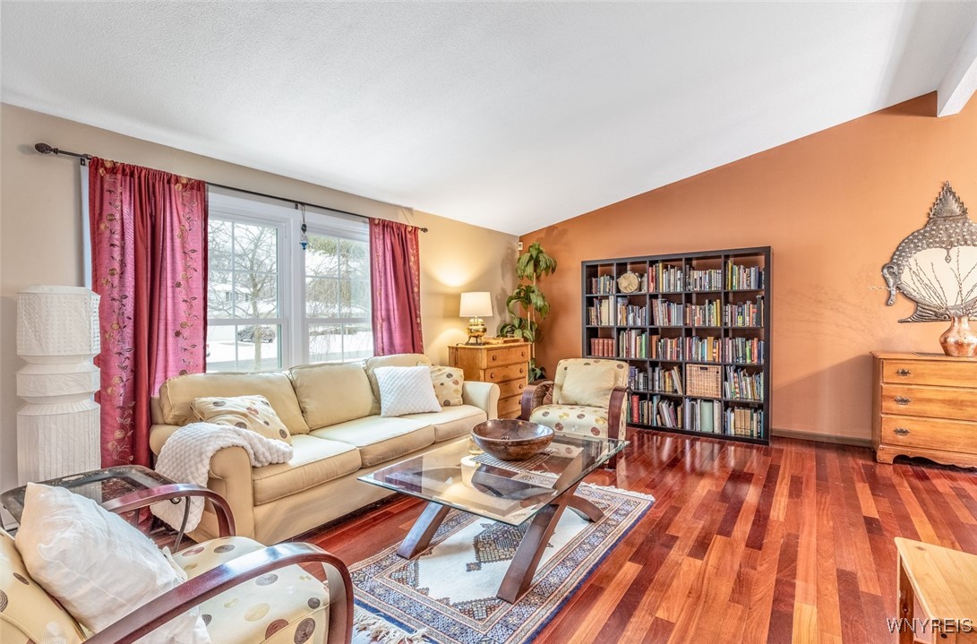 245 Ranch Trail Amherst, NY 14221 - Photo 4 of 37 The living room offers an abundance of natural lig