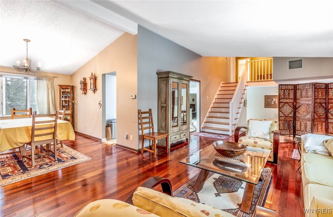 245 Ranch Trail Amherst, NY 14221 - Photo 8 of 37 Those beautiful hardwood floors extend up the stai