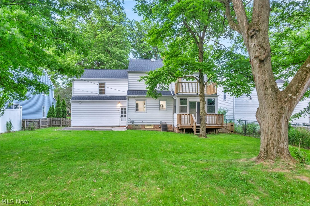 1352 Ford Road Lyndhurst, OH 44124 - Photo 42 of 48 Rear view of property featuring a lawn and a wooden deck