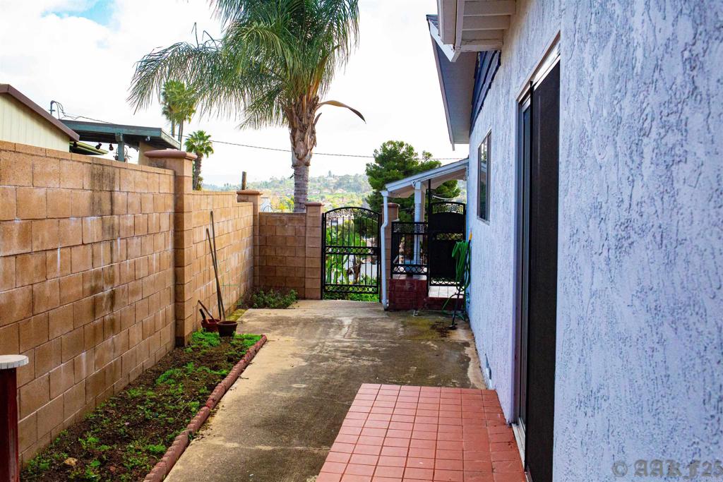 3458 Central Spring Valley Spring Valley, CA 91977 - Photo 4 of 4 a view of a path from a corridor