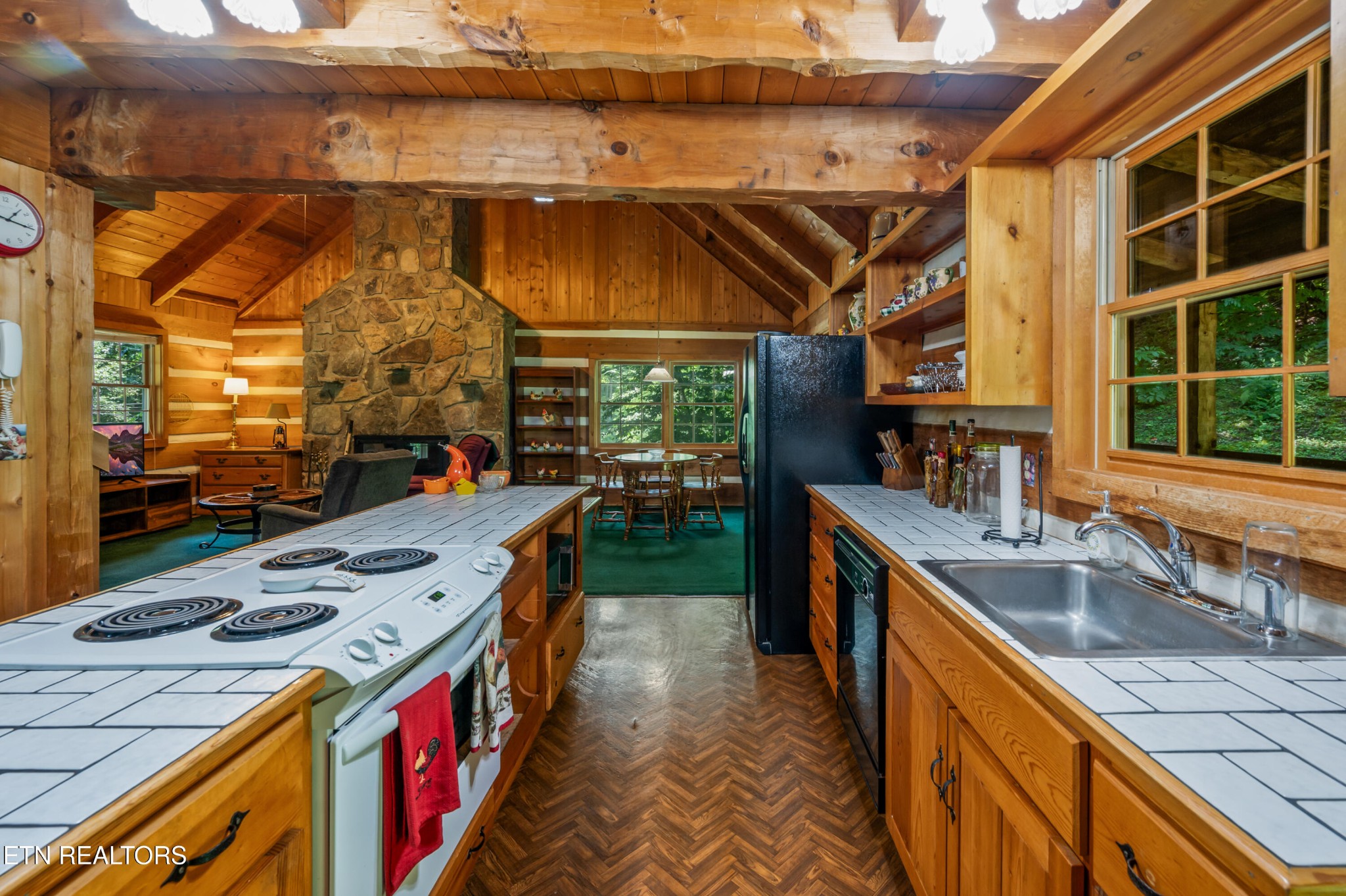 727 Hidden Valley Road Gatlinburg, TN 37738 - Photo 17 of 22 a storage room with a sink and a stove