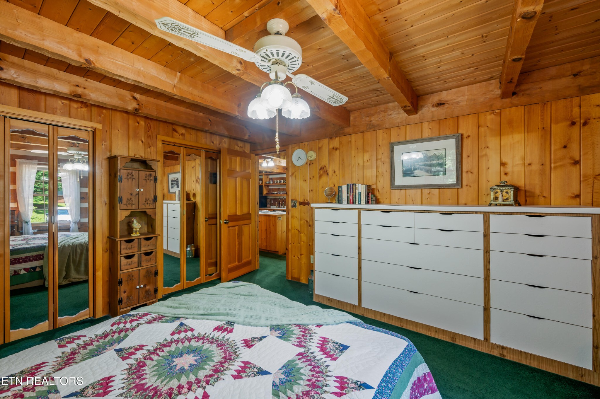 727 Hidden Valley Road Gatlinburg, TN 37738 - Photo 20 of 22 a bed room with a bed and a dresser