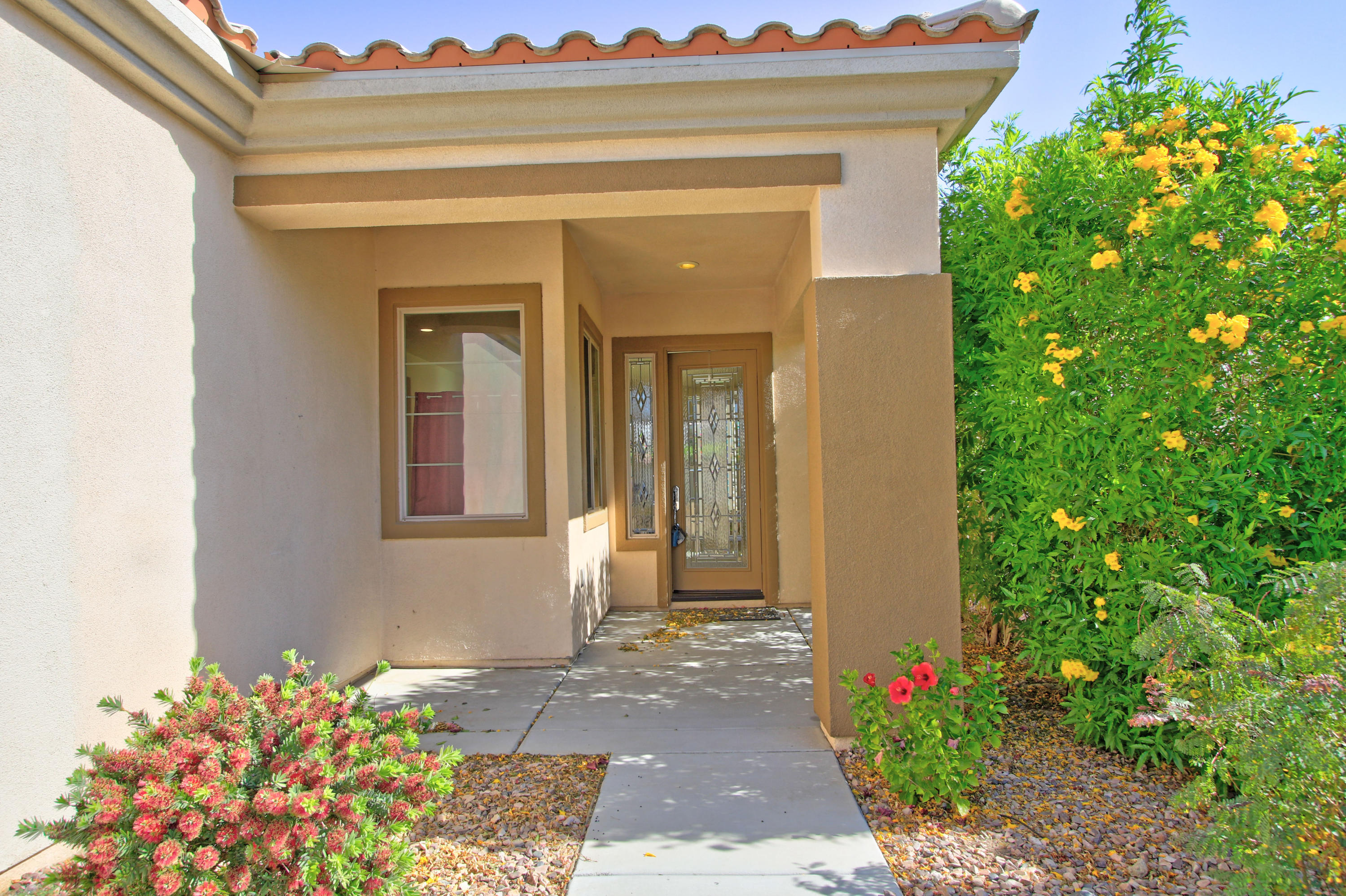 81642 Avenida Bolero Indio, CA 92203 - Photo 2 of 38 a front view of a house