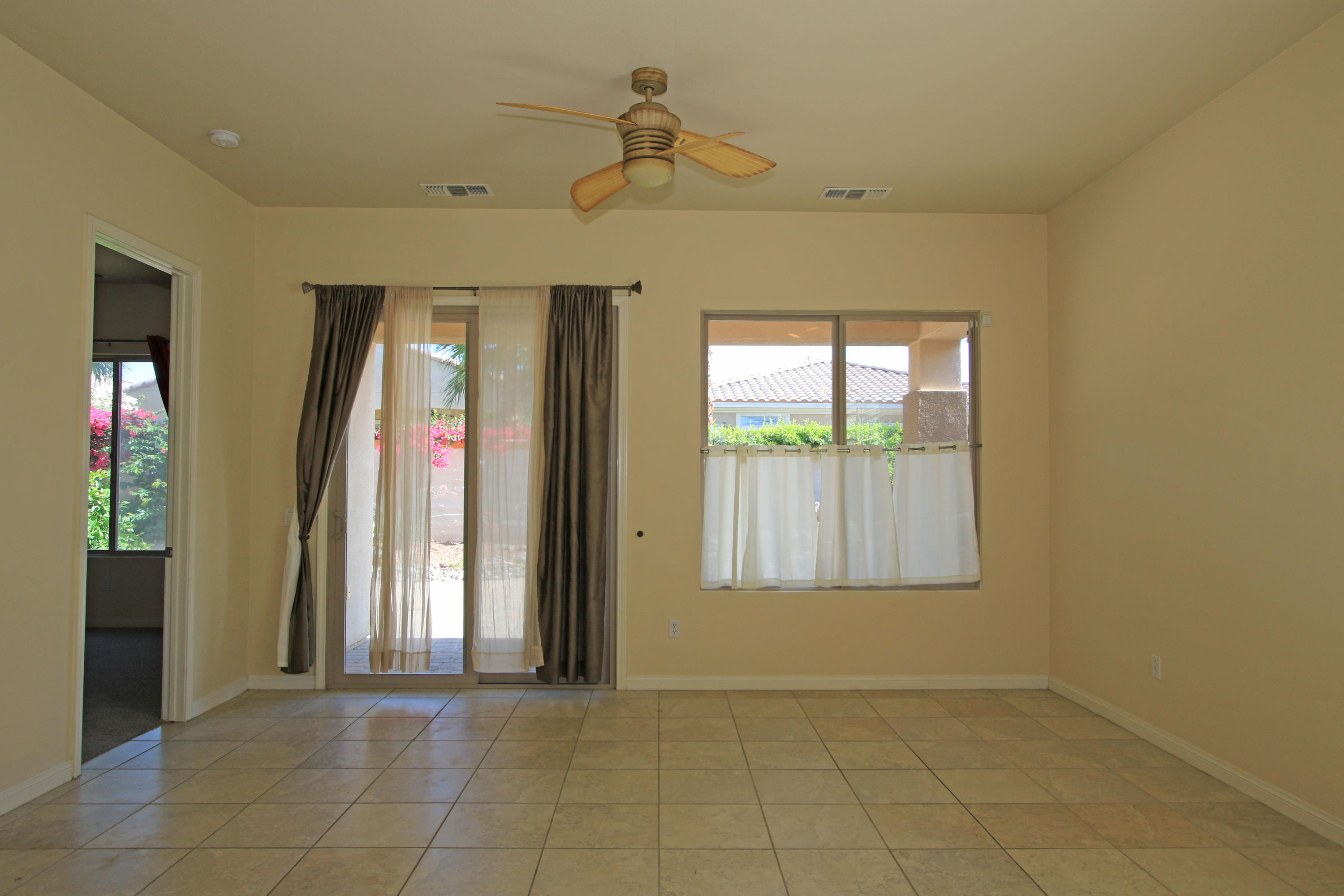 81642 Avenida Bolero Indio, CA 92203 - Photo 16 of 38 an empty room with windows and closet