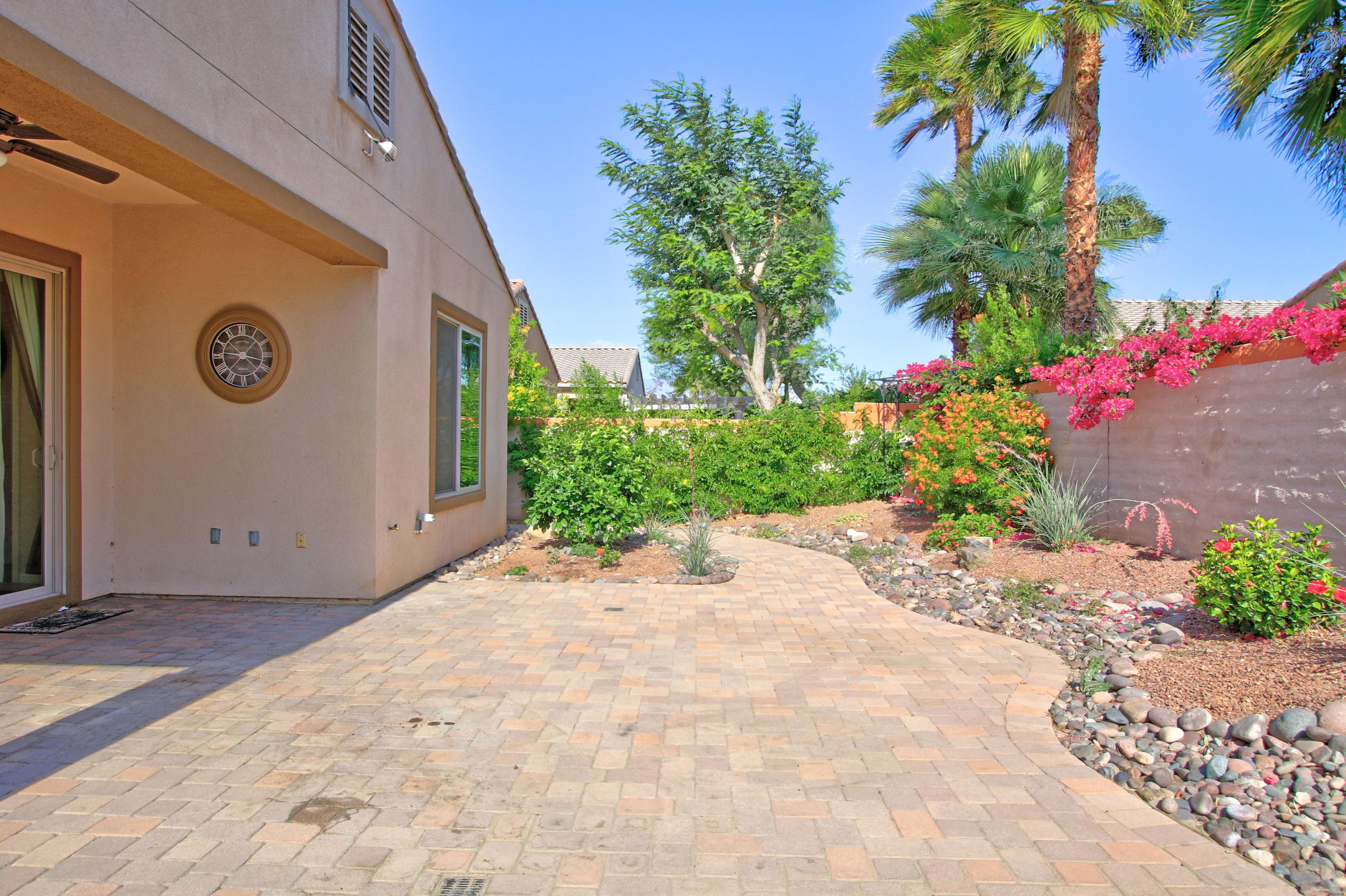 81642 Avenida Bolero Indio, CA 92203 - Photo 19 of 38 a view of a house with a yard
