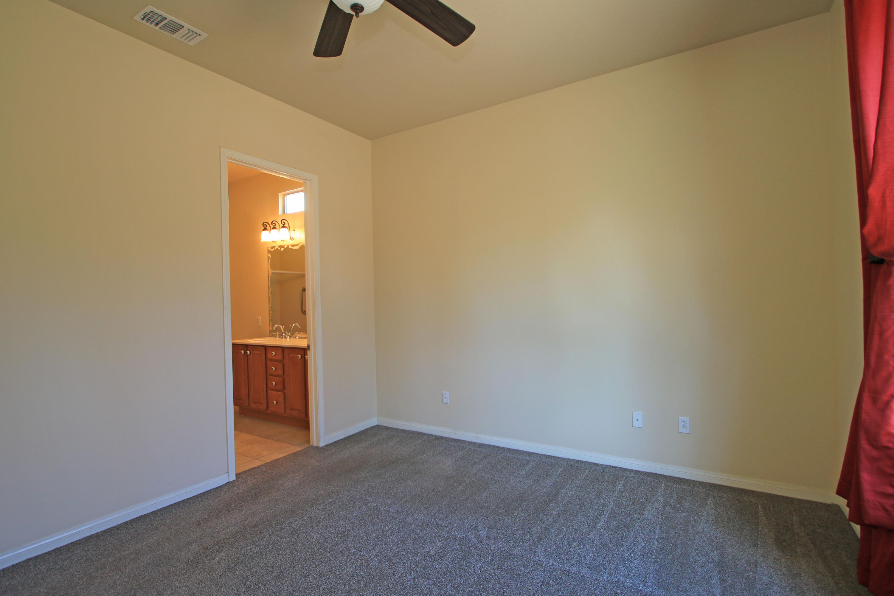 81642 Avenida Bolero Indio, CA 92203 - Photo 27 of 38 an empty room with windows