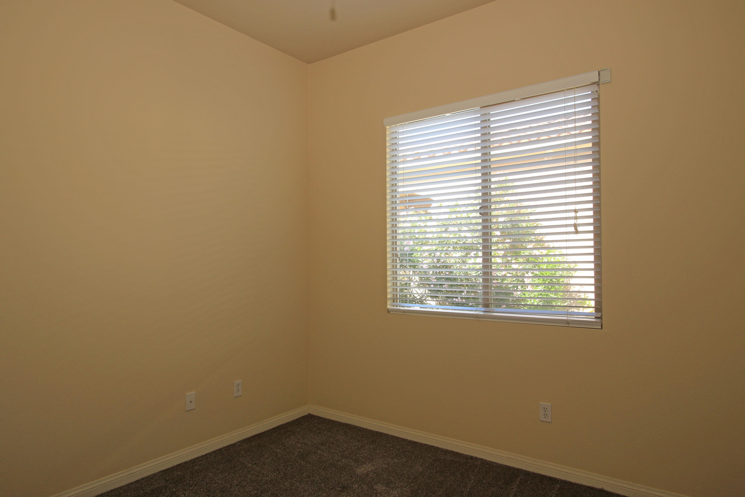 81642 Avenida Bolero Indio, CA 92203 - Photo 32 of 38 an empty room with a window