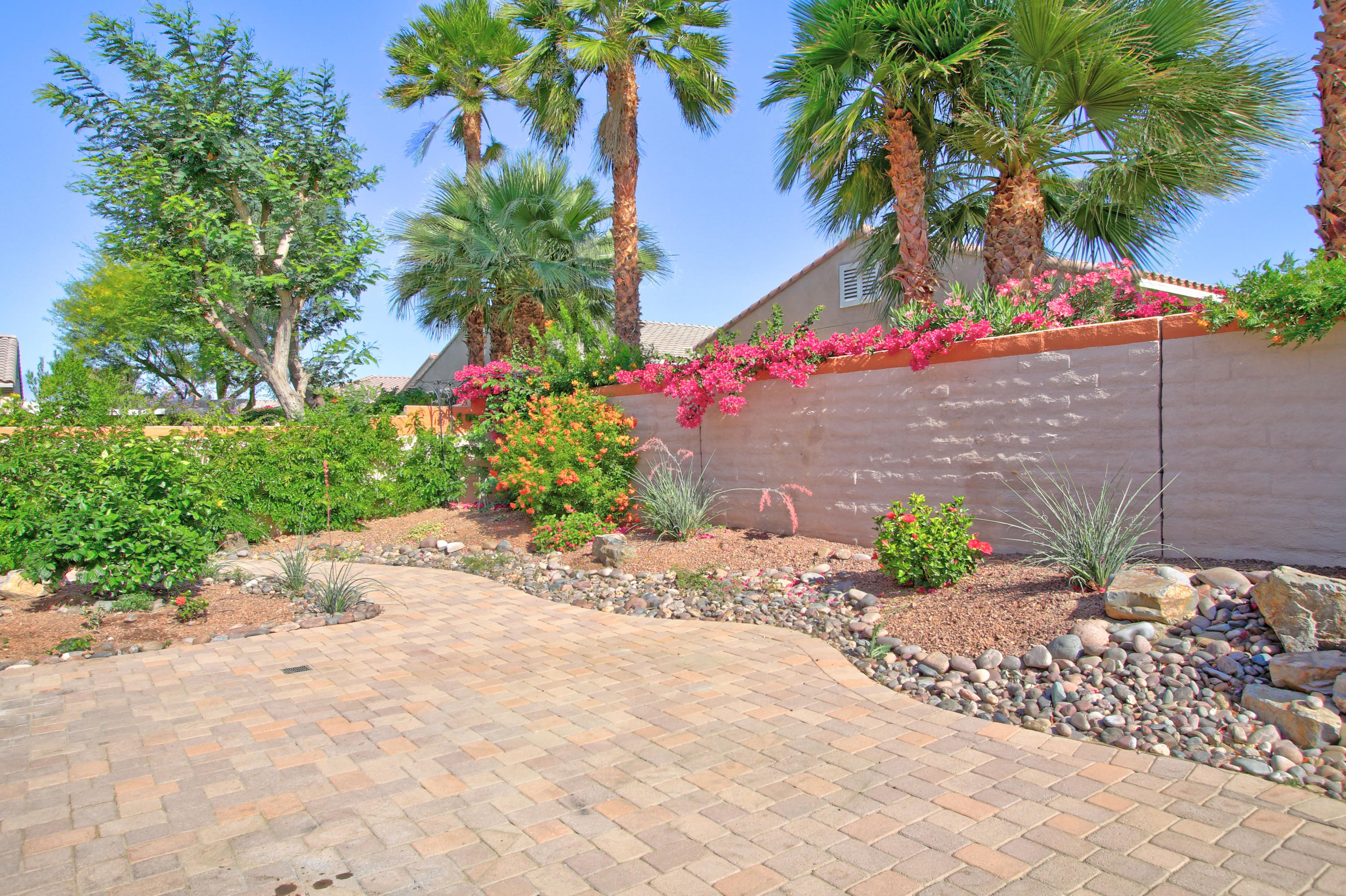 81642 Avenida Bolero Indio, CA 92203 - Photo 37 of 38 a street view with a big garden
