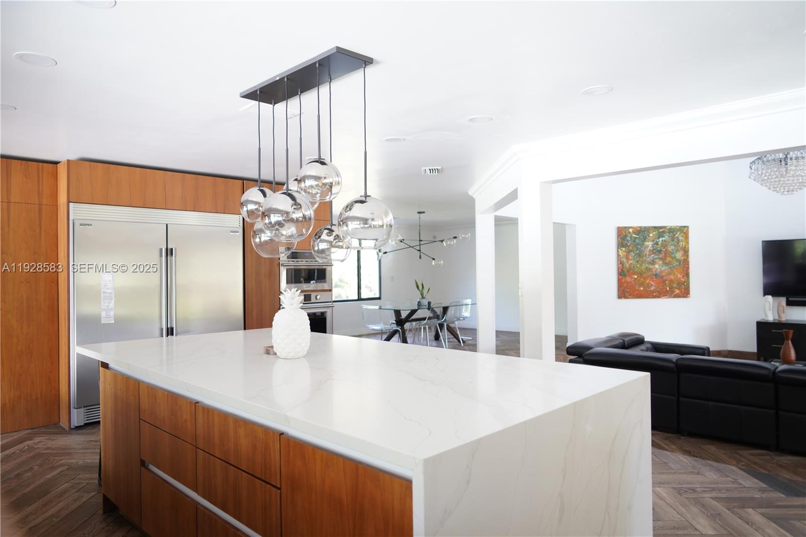 18901 Southwest 50th Street Southwest Ranches, FL 33332 - Photo 11 of 51 a kitchen with a sink and a refrigerator