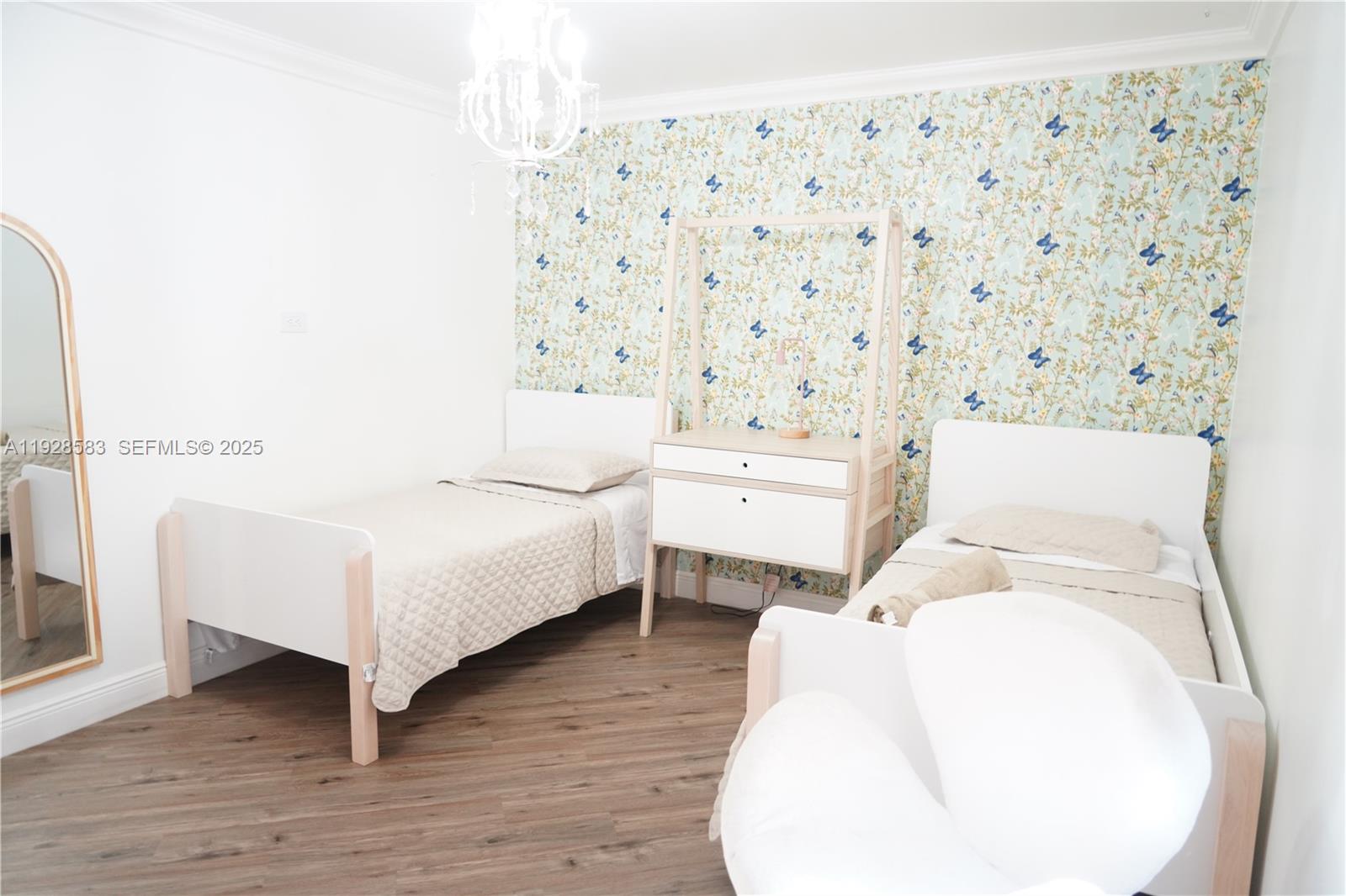 18901 Southwest 50th Street Southwest Ranches, FL 33332 - Photo 26 of 51 a spacious bedroom with a bed and a chair