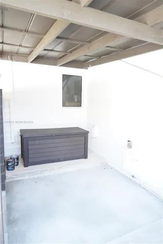 a bathroom with a shower and toilet