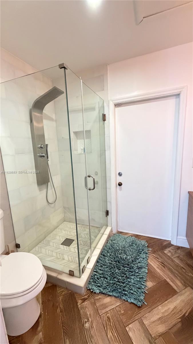 18901 Southwest 50th Street Southwest Ranches, FL 33332 - Photo 41 of 51 a bathroom with a shower and toilet