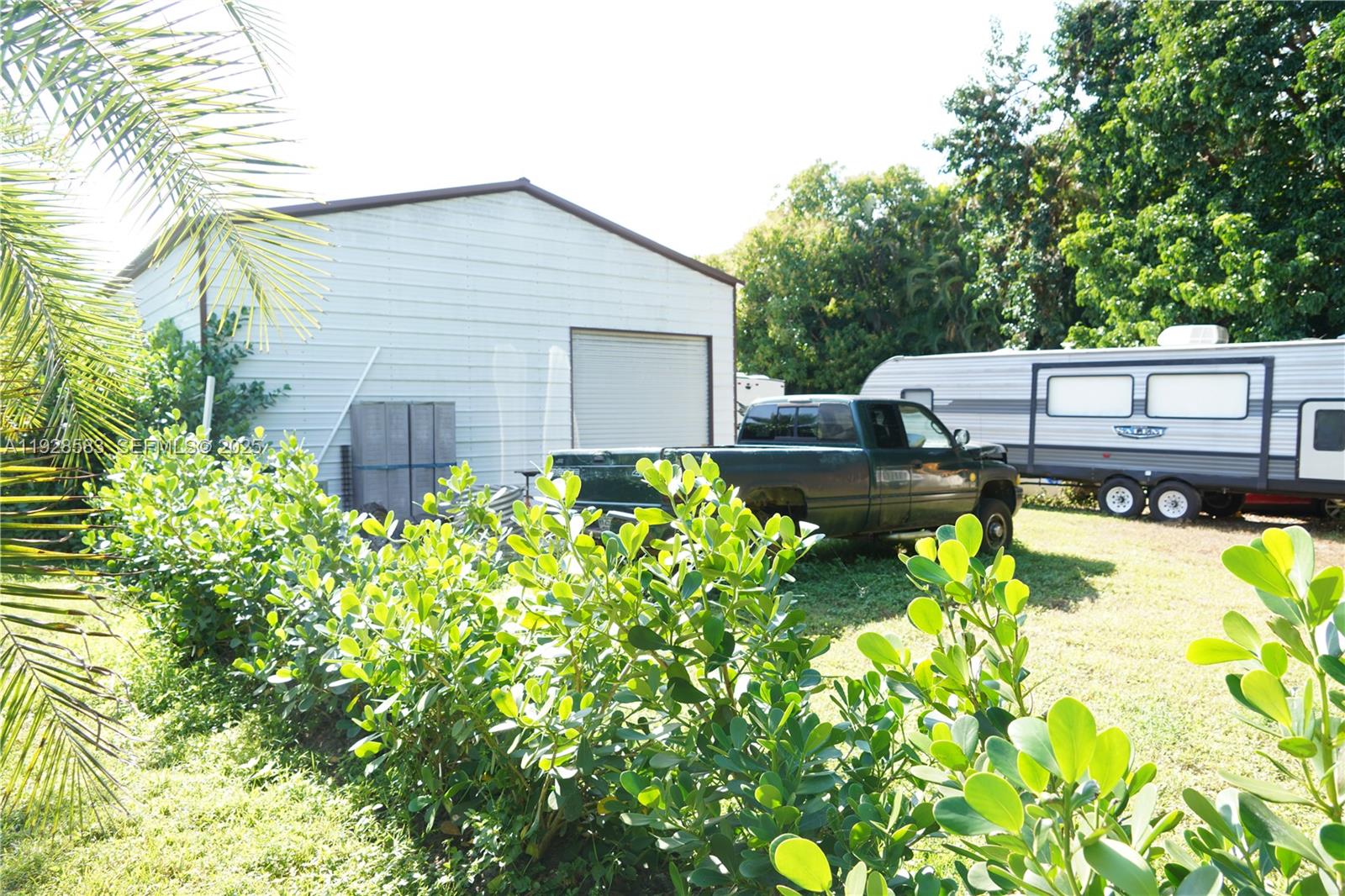 18901 Southwest 50th Street Southwest Ranches, FL 33332 - Photo 45 of 51 a house view with a swimming pool