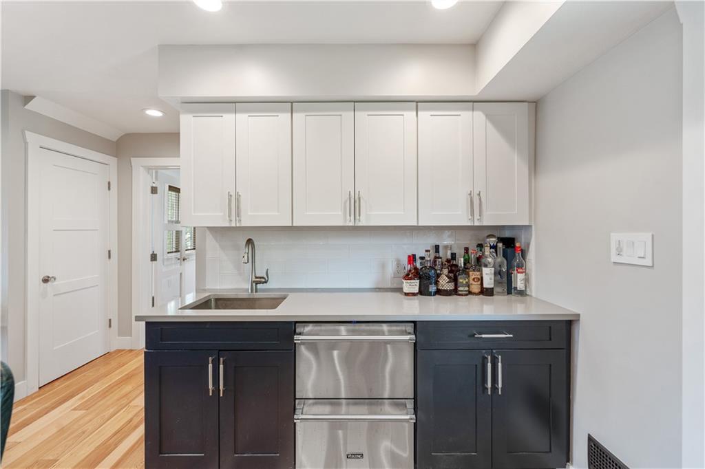 758 5th Street Beaver, PA 15009 - Photo 13 of 38 a kitchen with a sink cabinets and a wooden floor