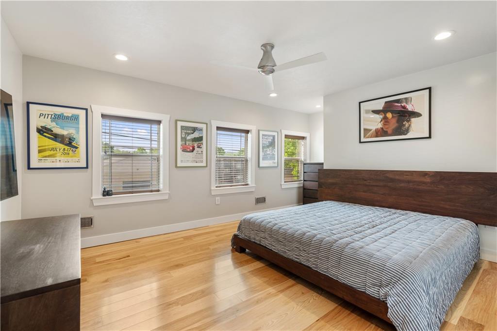 758 5th Street Beaver, PA 15009 - Photo 17 of 38 a spacious bedroom with a large bed and a window