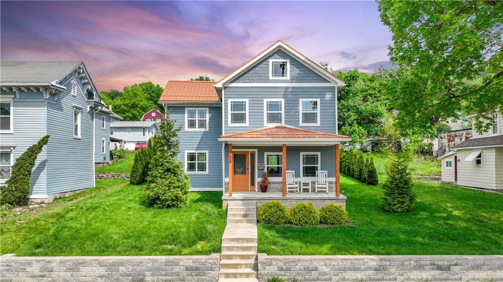 758 5th Street Beaver, PA 15009 - Photo 2 of 38 a front view of a house with garden