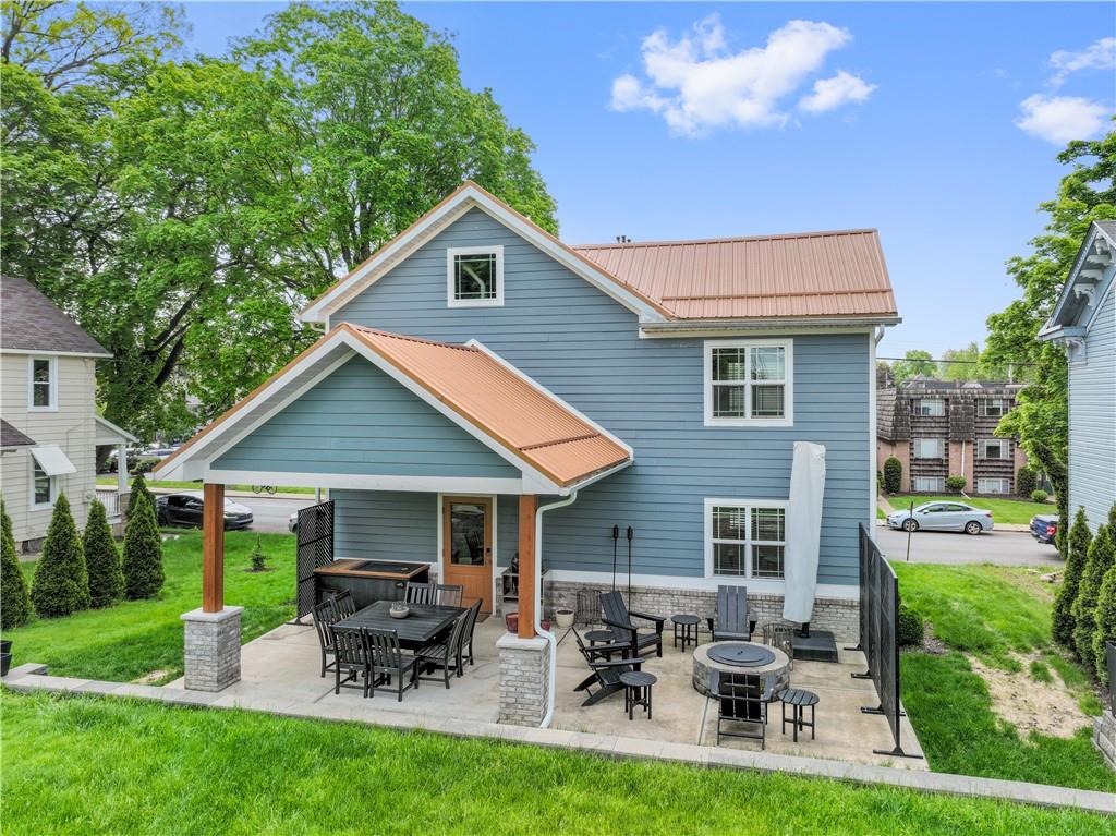 758 5th Street Beaver, PA 15009 - Photo 33 of 38 a view of a house with backyard sitting area and garden